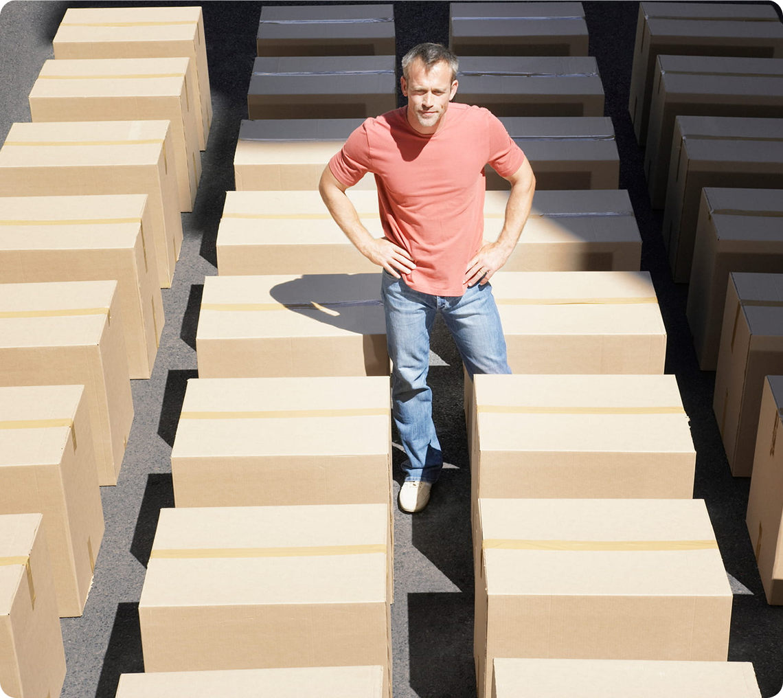 Individual in a maze of boxes
